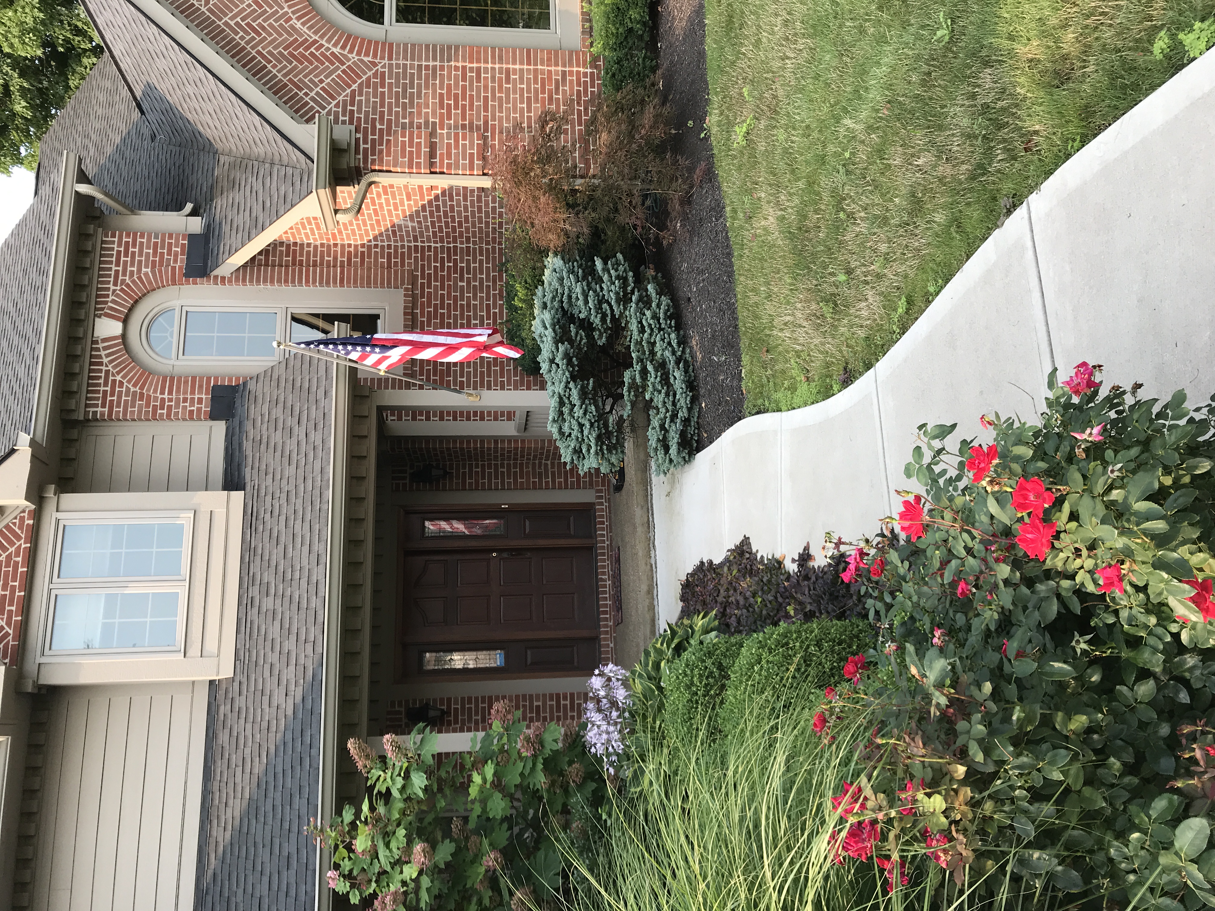 Heshe's flag hung off the front porch'